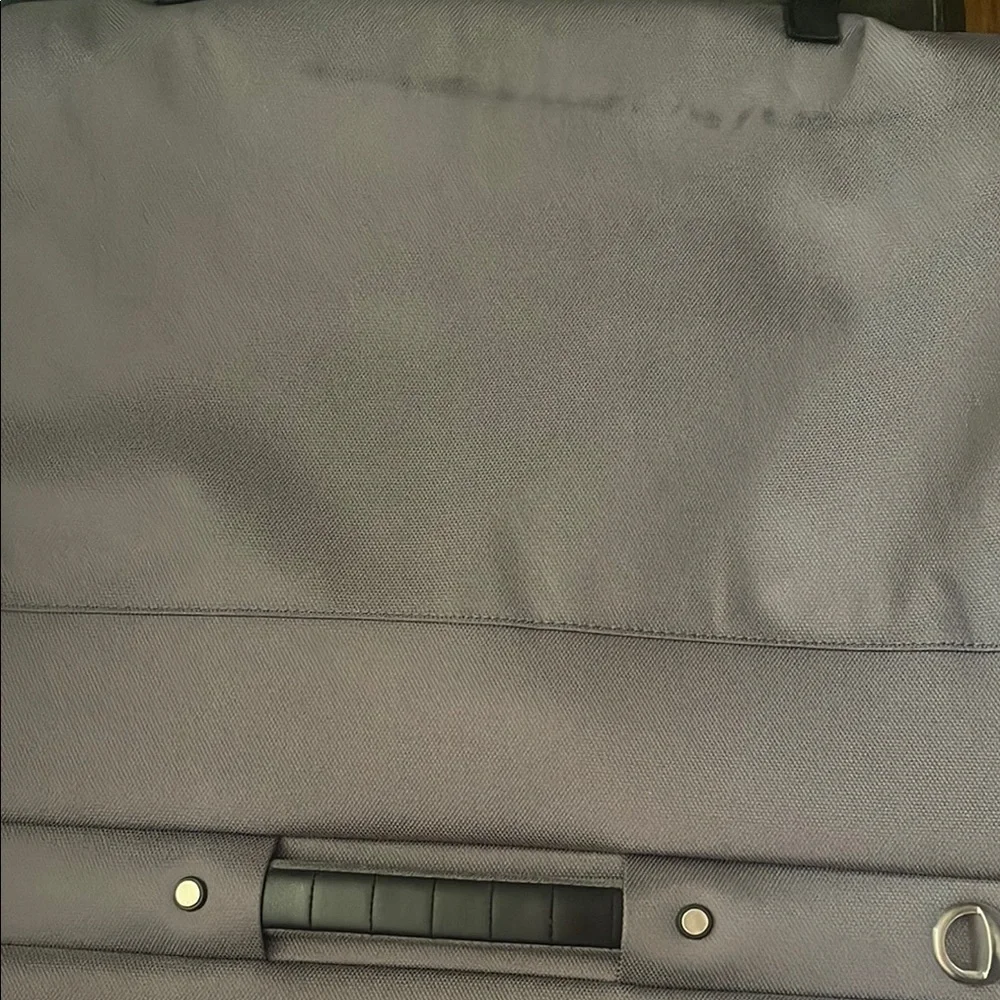 Black and Gray Travel Bags with Metal Accents